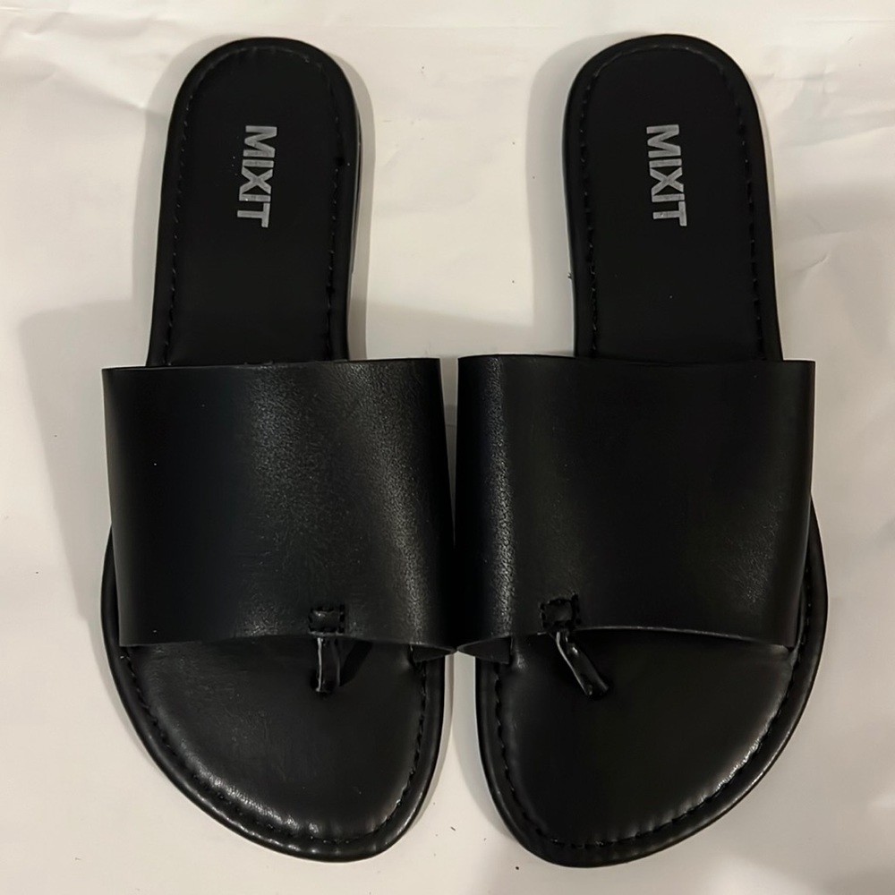 Black slip on sandals